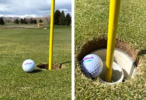 Close up of a cup restrictor when sitting inside the cup on a putting green