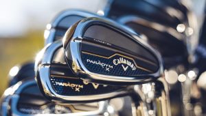 A grouping of Callaway golf clubs featuring the paradym line.